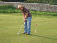 The Bandit practicing on the putting green